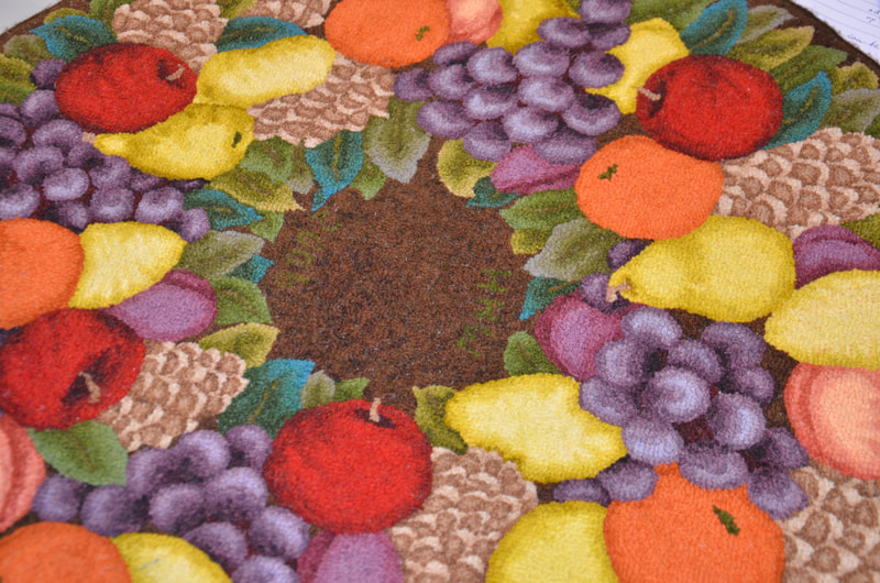 One of Peggy's favorite rugs to put on the table with a dish in the center.  